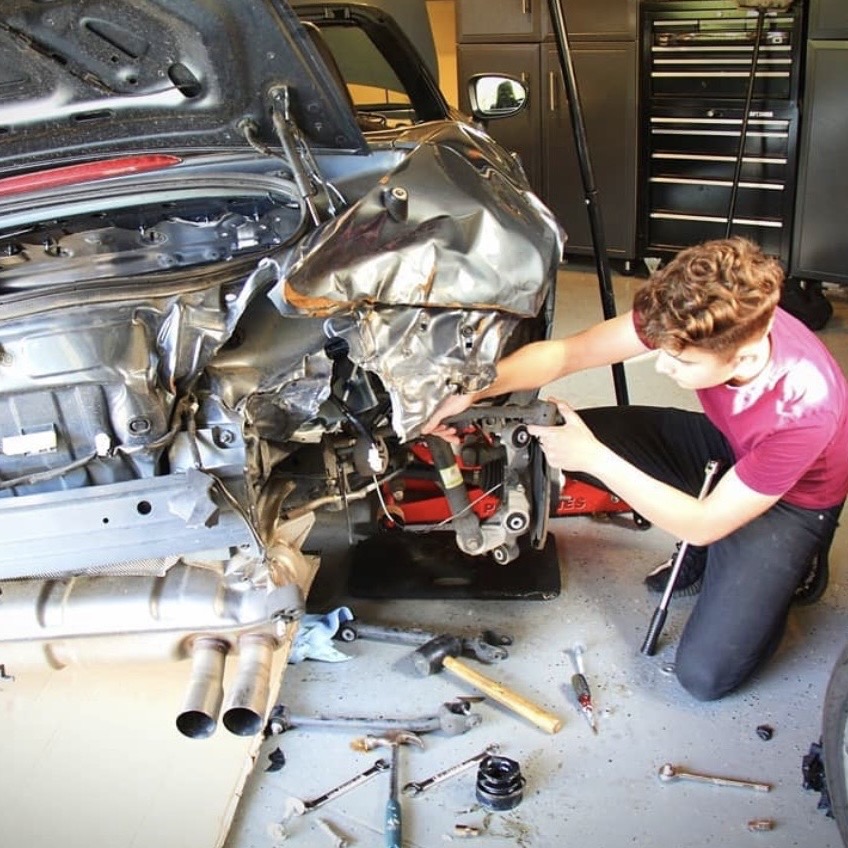 Vitale Diamandis working on a car rebuild at 15